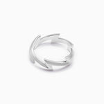 Silver lighting bolt ring on a white background