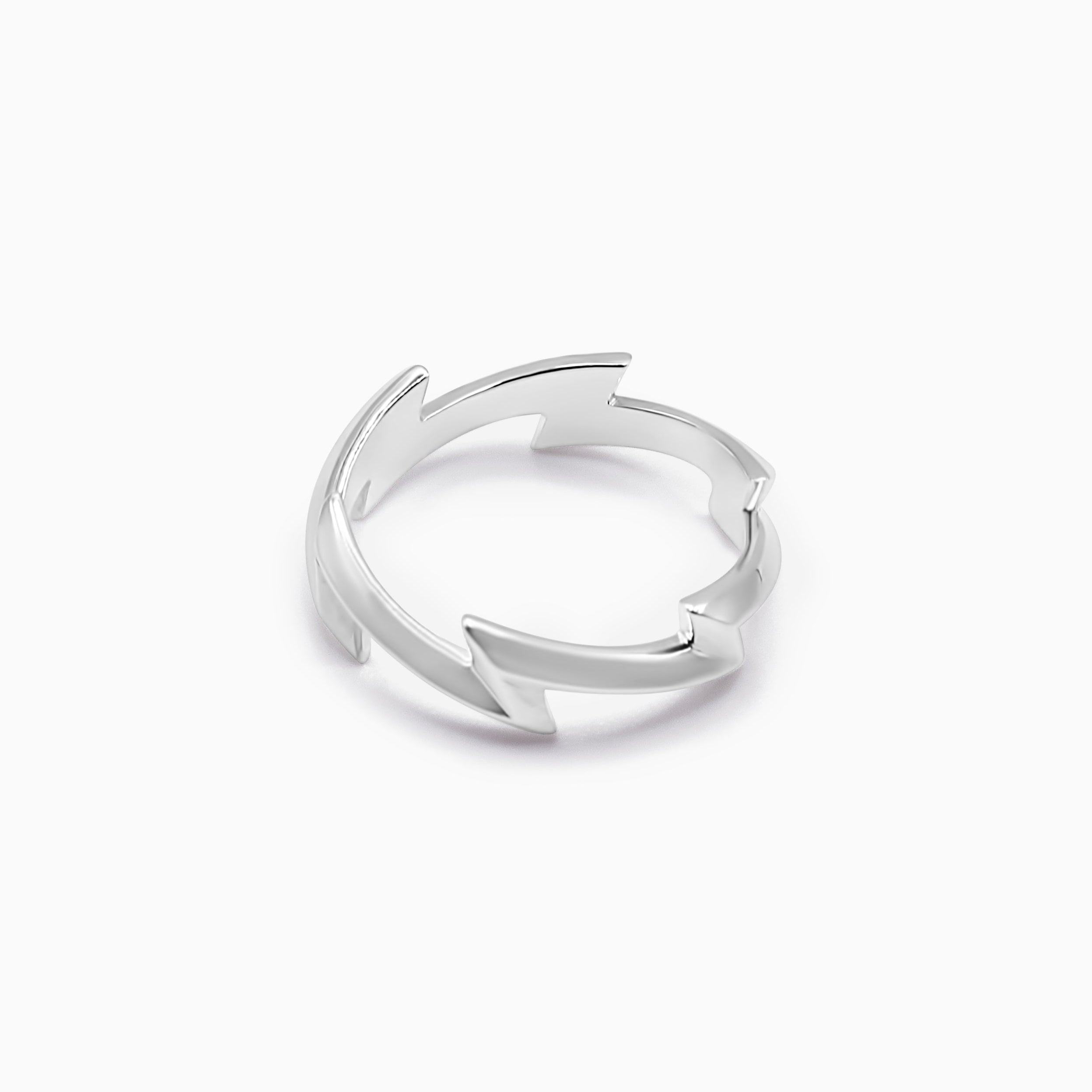 Silver lighting bolt ring on a white background