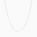 Silver chain link necklace on a white background