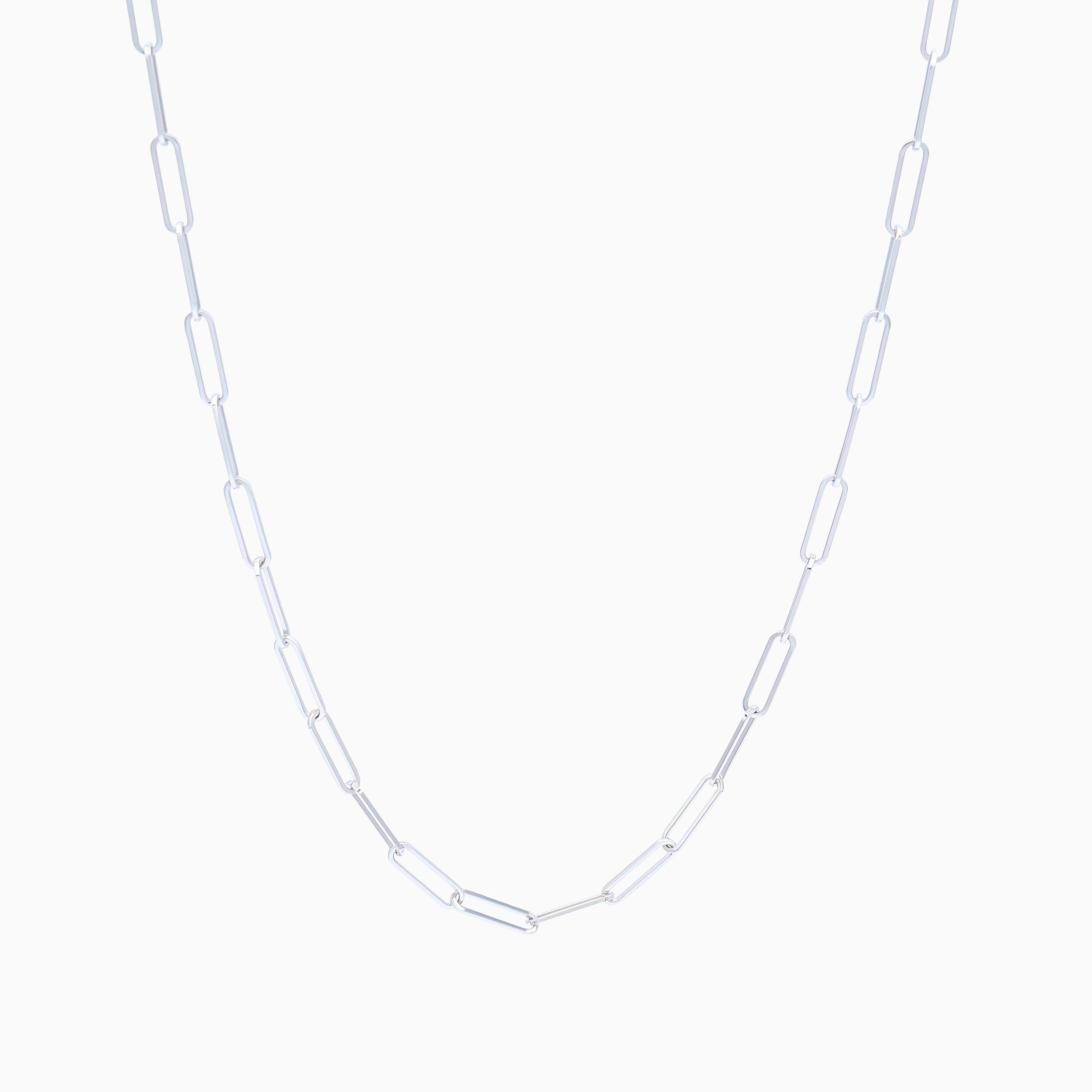 Silver chain link necklace on a white background