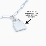 Reversible padlock on a white chain with text indicating reversibility.