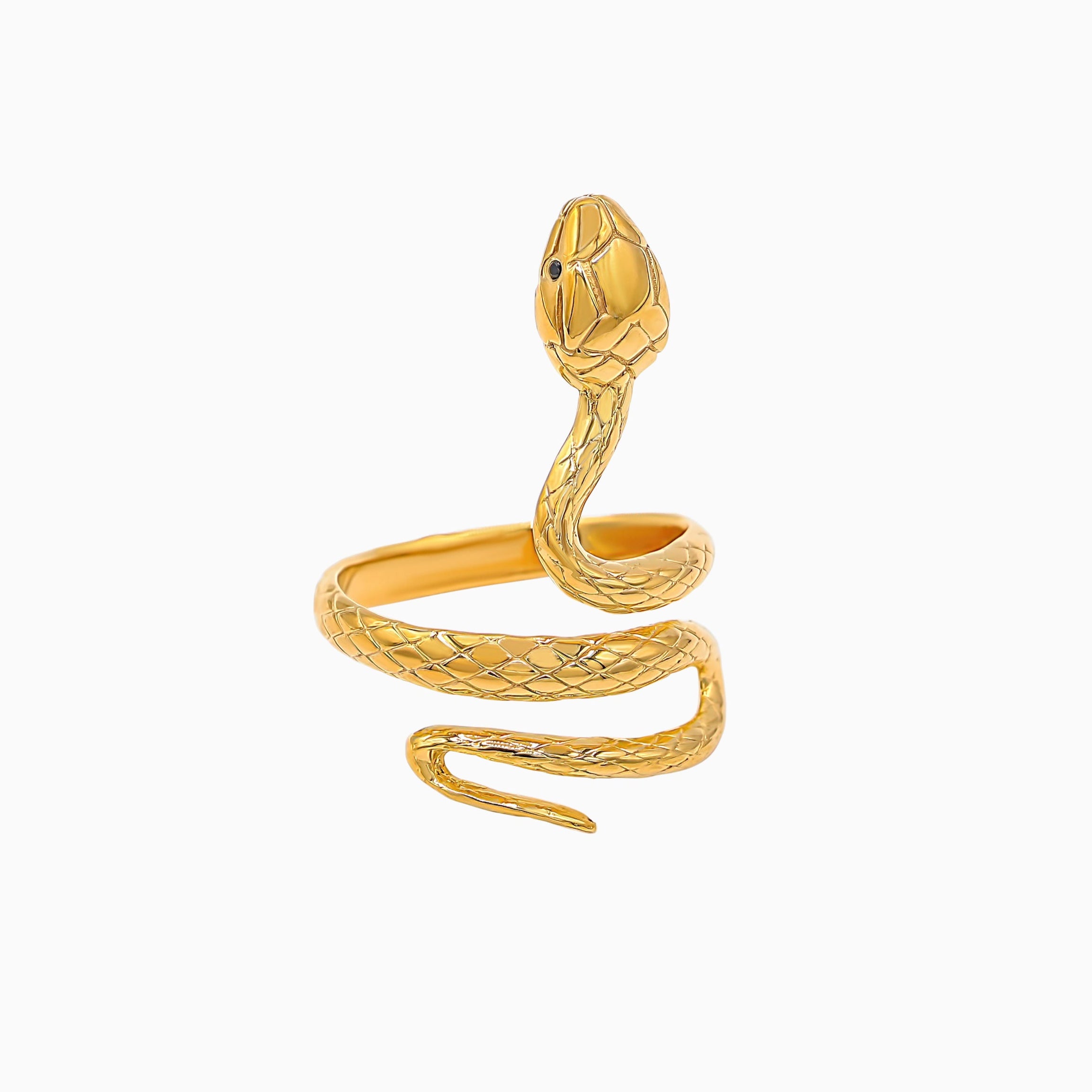 Gold snake-shaped ring on a white background