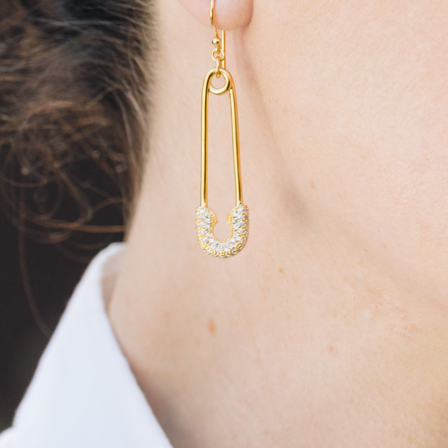safety pin earring on caucasian lady