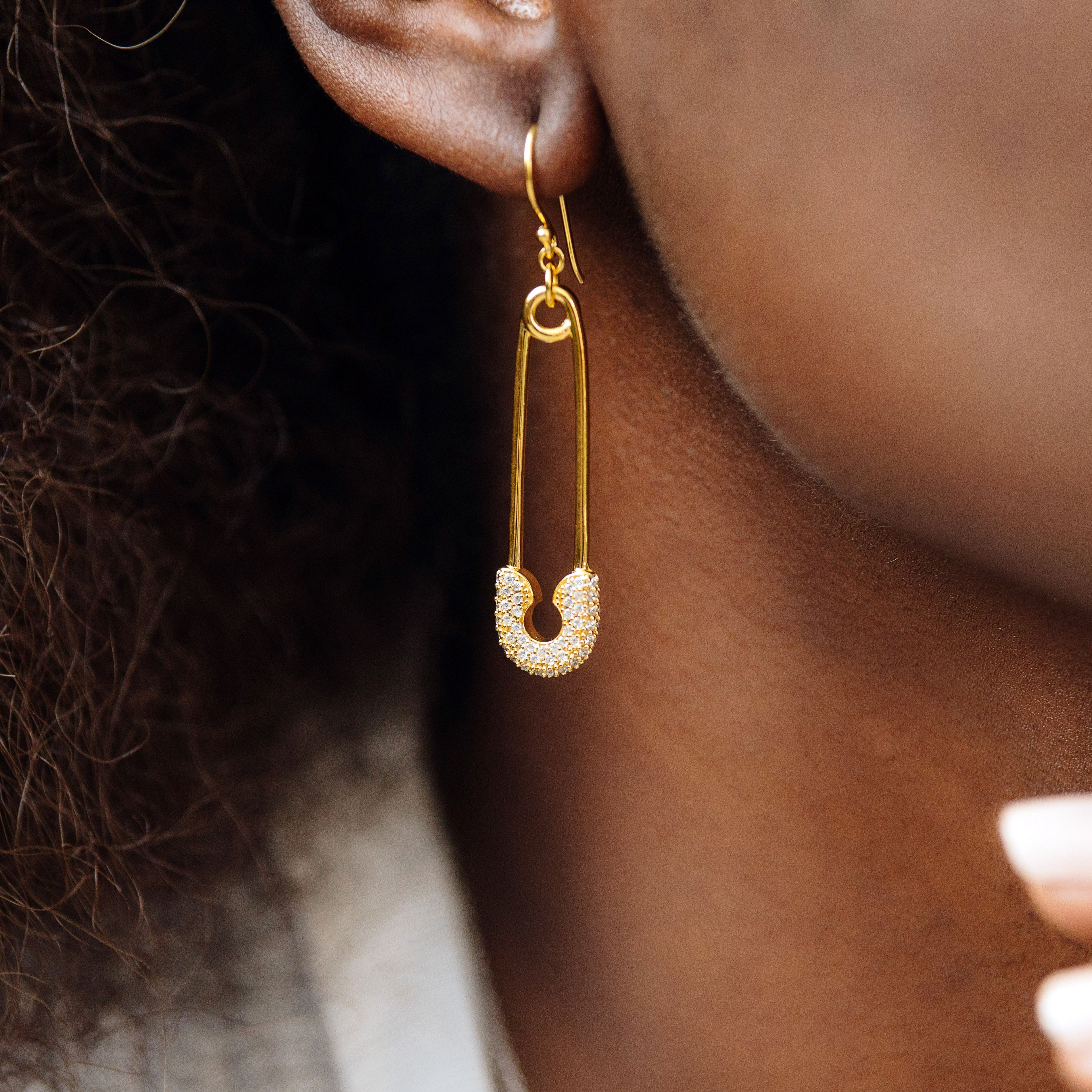 safety pin earring on African American